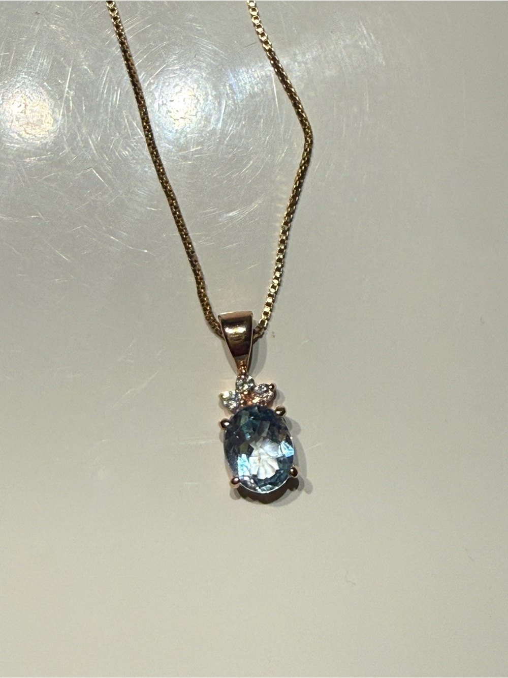 Elegant Blue Gemstone Pendant Necklace in Gold